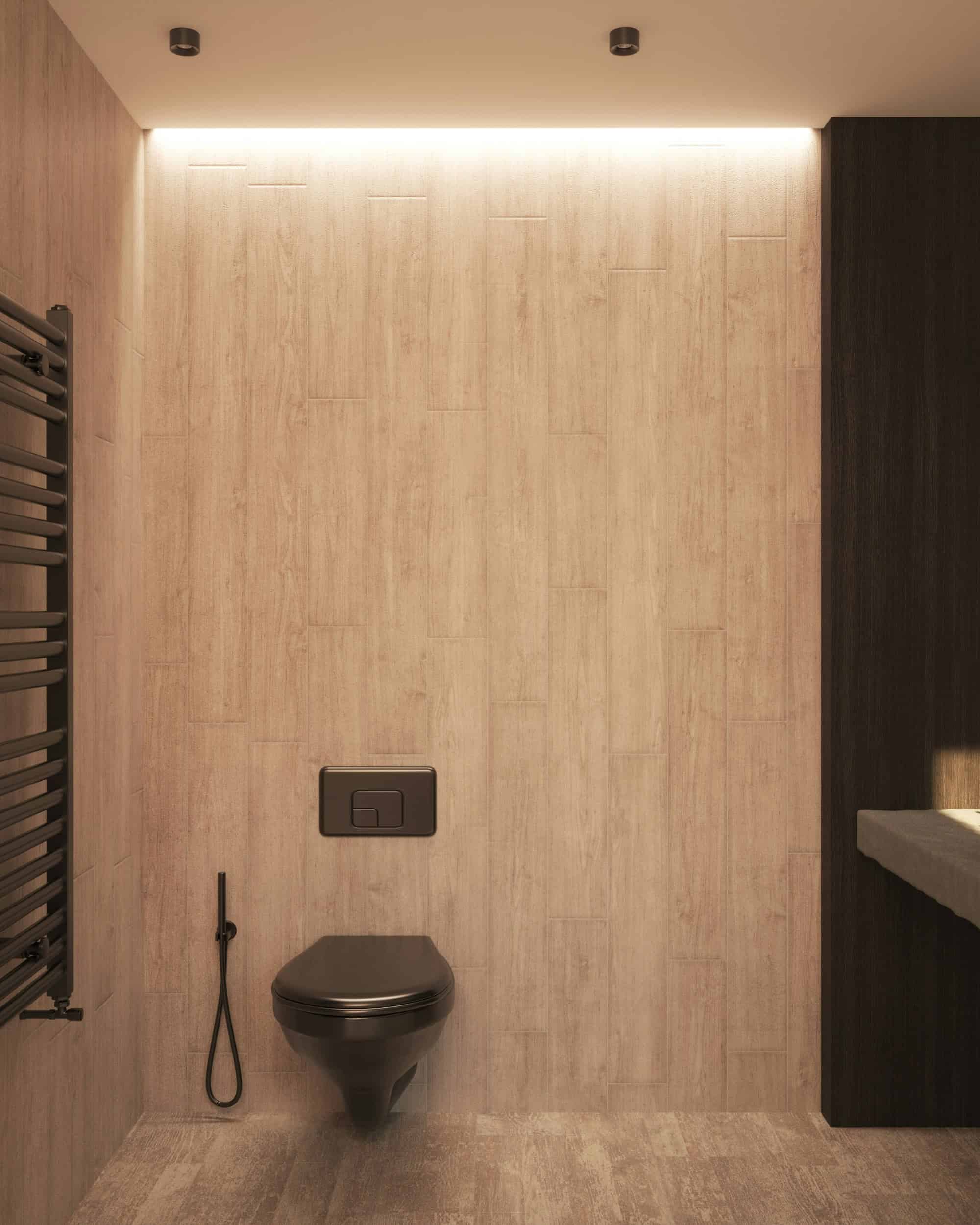 Une salle de bains moderne avec des murs texturés en bois, des toilettes murales noires, une plaque de chasse d'eau assortie, un bidet à main et un éclairage ambiant au plafond, le tout conçu pour respecter la norme électrique salle de bains en matière de sécurité et de style.
